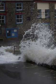 Photo Gallery Image - Waves crashing on Polruan Quay 14/02/2014